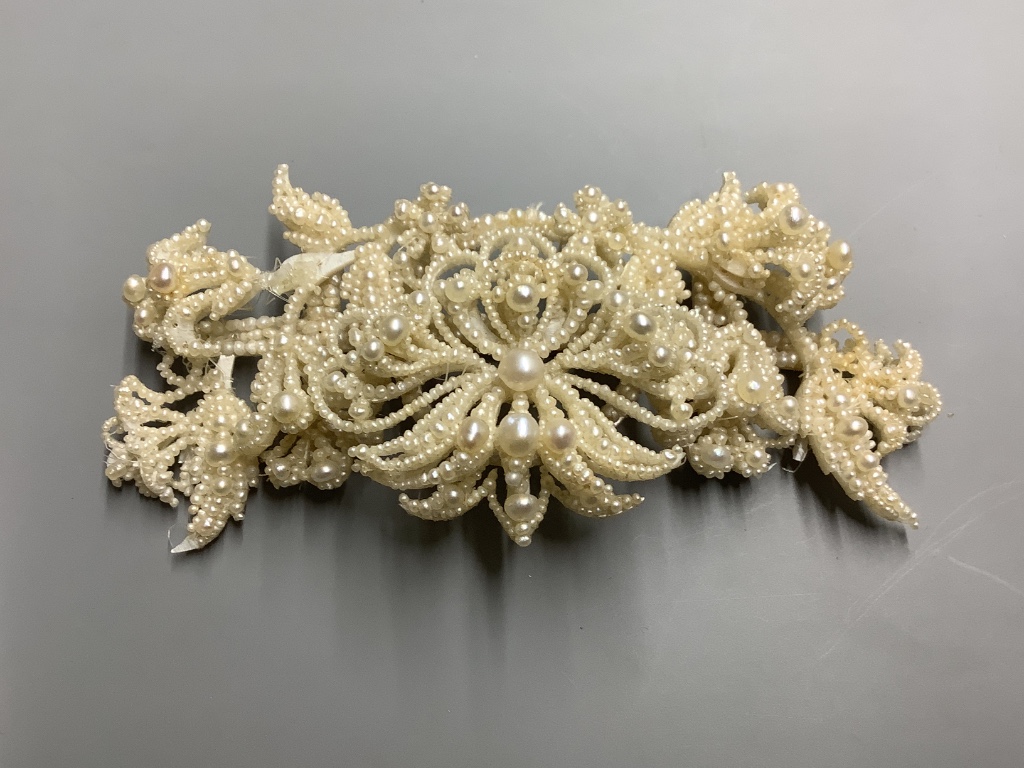 A 19th century seed pearl encrusted brooch, 10.8 cm.